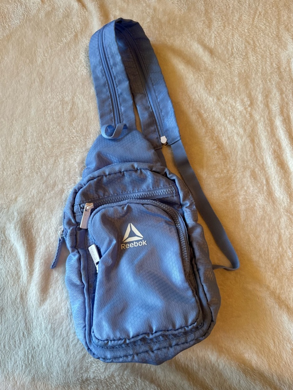 Reebok  Blue Sling Pack with Front Zip Pocket